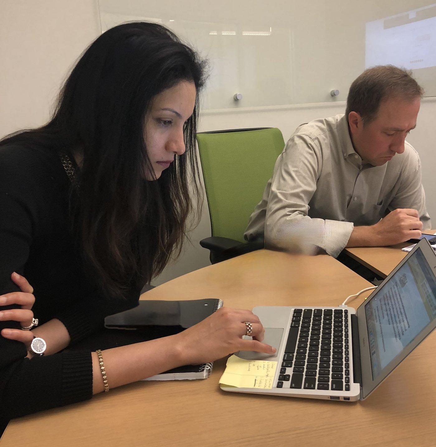 A participant working through a lesson on her laptop